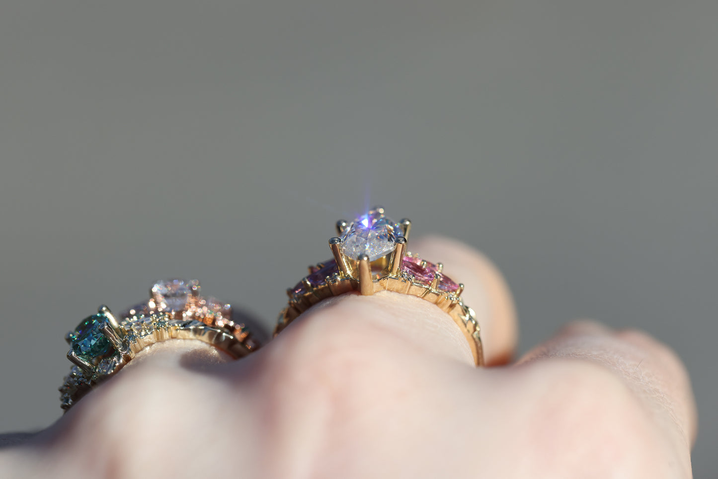 Enchanted garden with 2ct moissanite center and pink sapphire sides