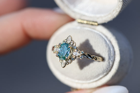 Galadriel with 7x5mm oval teal moissanite