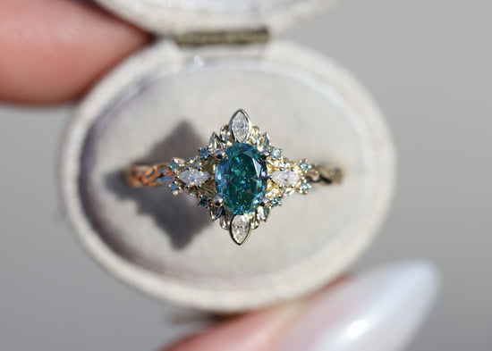 Galadriel with 7x5mm oval teal moissanite