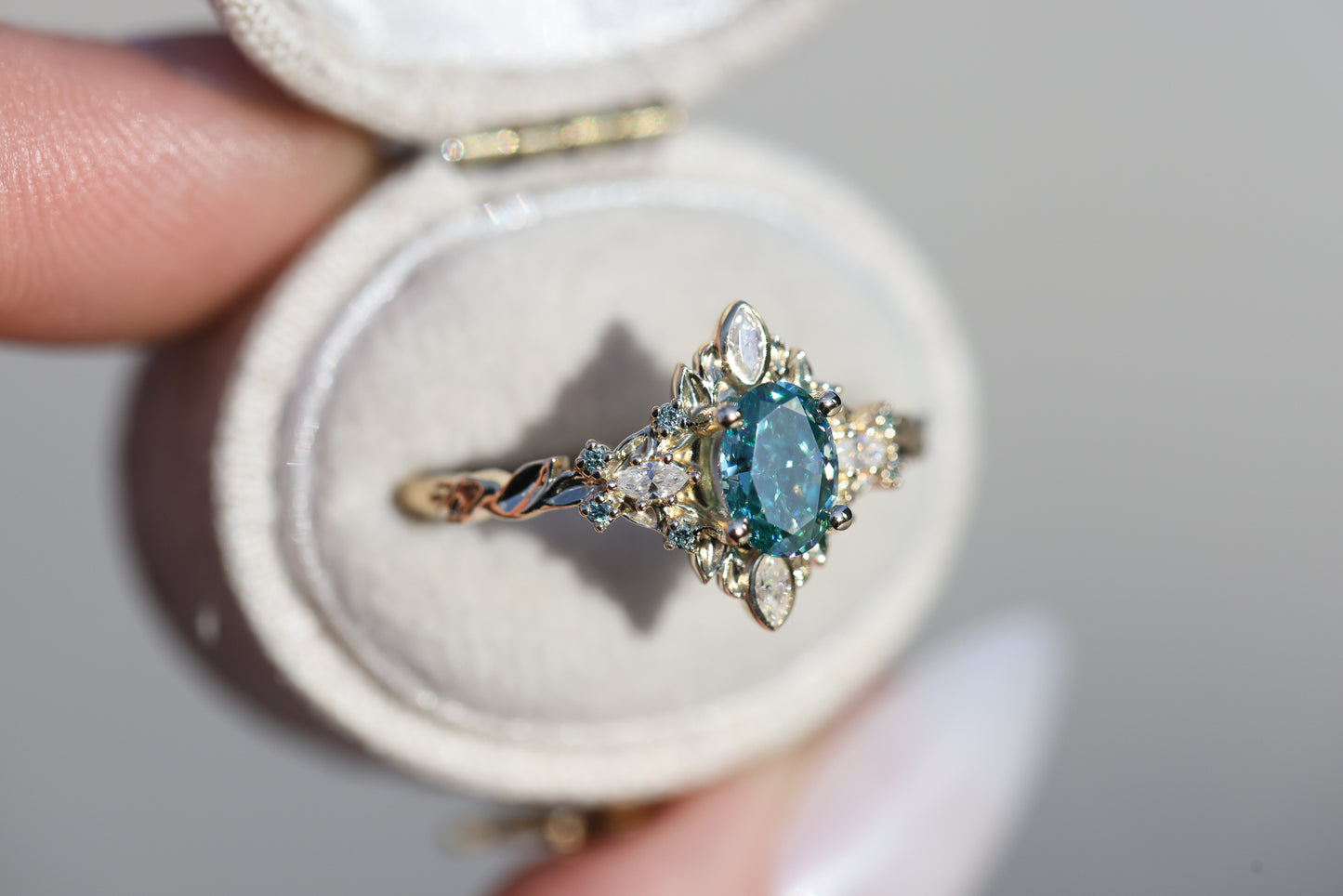 Galadriel with 7x5mm oval teal moissanite