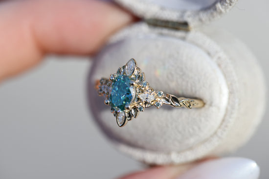 Galadriel with 7x5mm oval teal moissanite