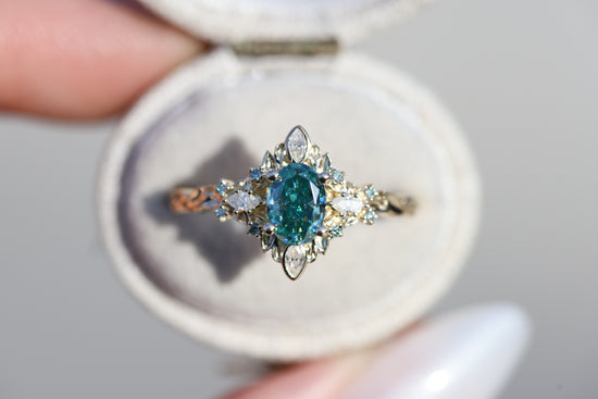 Galadriel with 7x5mm oval teal moissanite