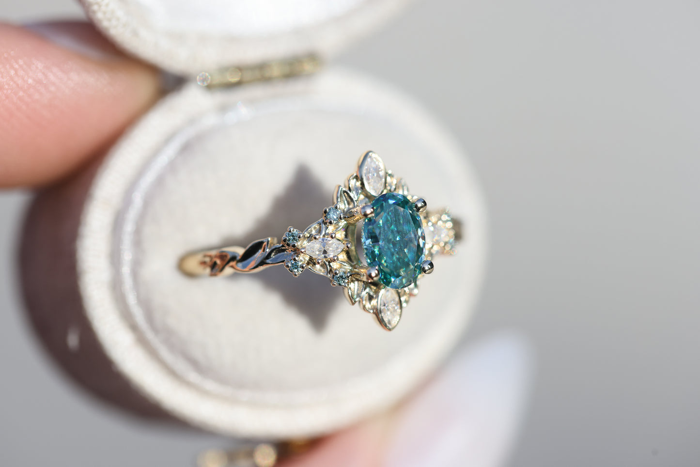 Galadriel with 7x5mm oval teal moissanite