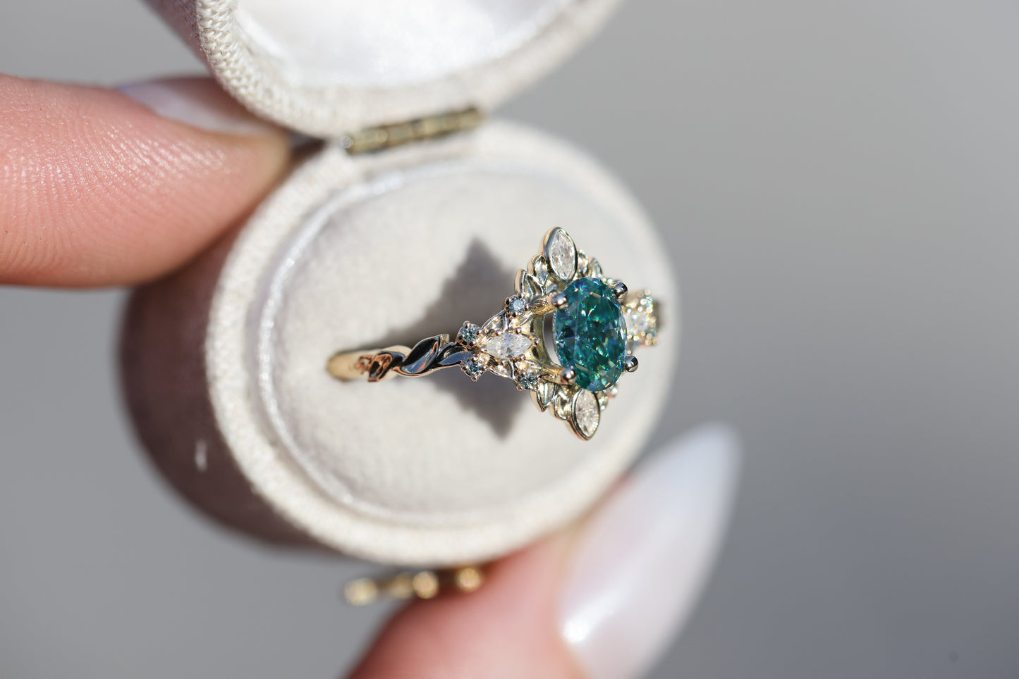 Galadriel with 7x5mm oval teal moissanite