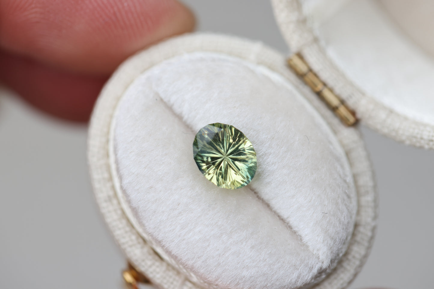 1.49ct oval yellow green sapphire - Starbrite cut by John Dyer