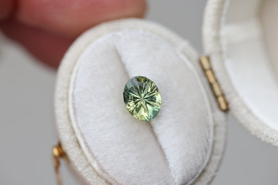 1.49ct oval yellow green sapphire - Starbrite cut by John Dyer