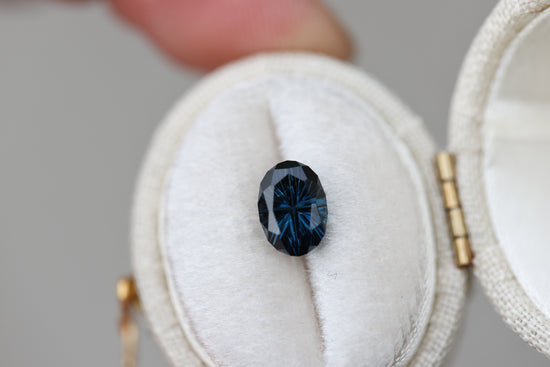 1.69ct oval deep blue sapphire - Starbrite cut by John Dyer