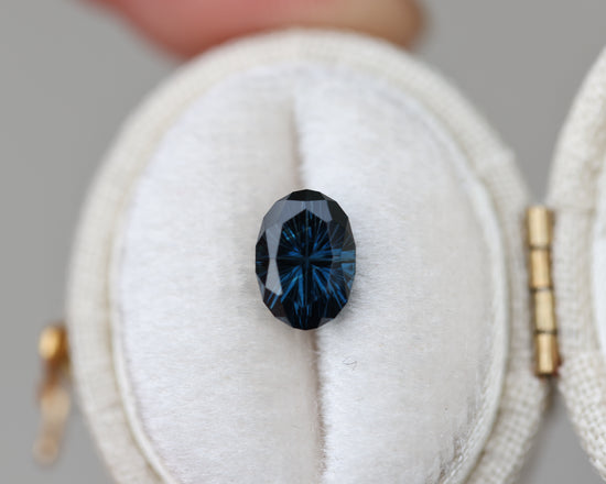Load image into Gallery viewer, 1.69ct oval deep blue sapphire - Starbrite cut by John Dyer
