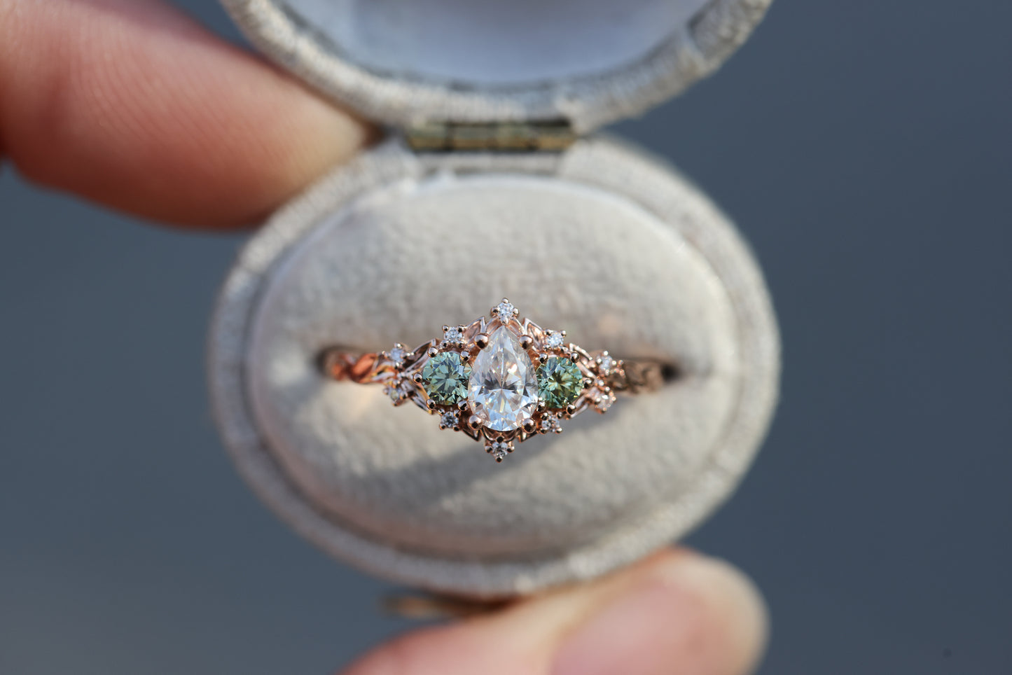 Briar Rose Three Stone with 6x4mm Pear Moissanite and mint side stones