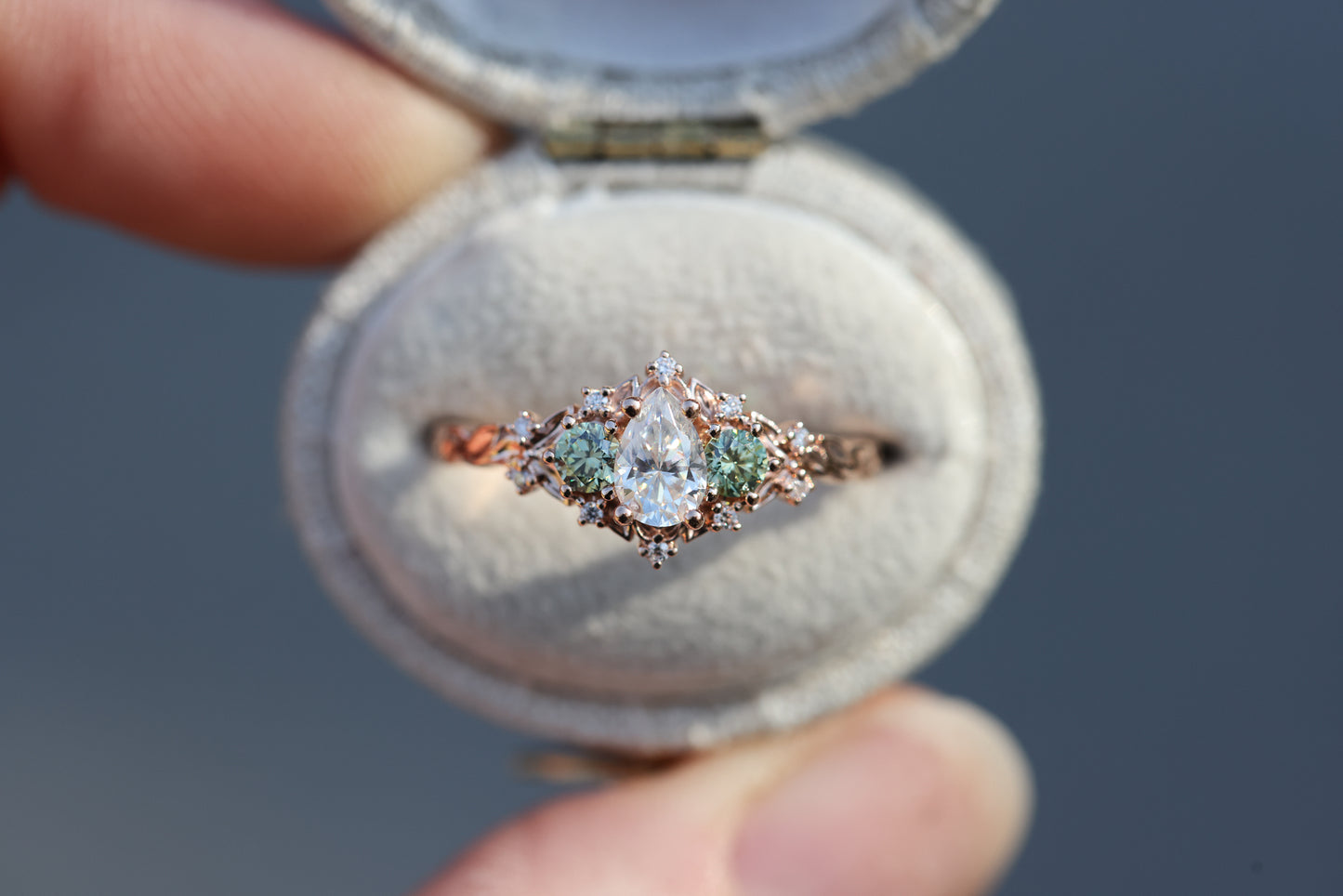 Briar Rose Three Stone with 6x4mm Pear Moissanite and mint side stones