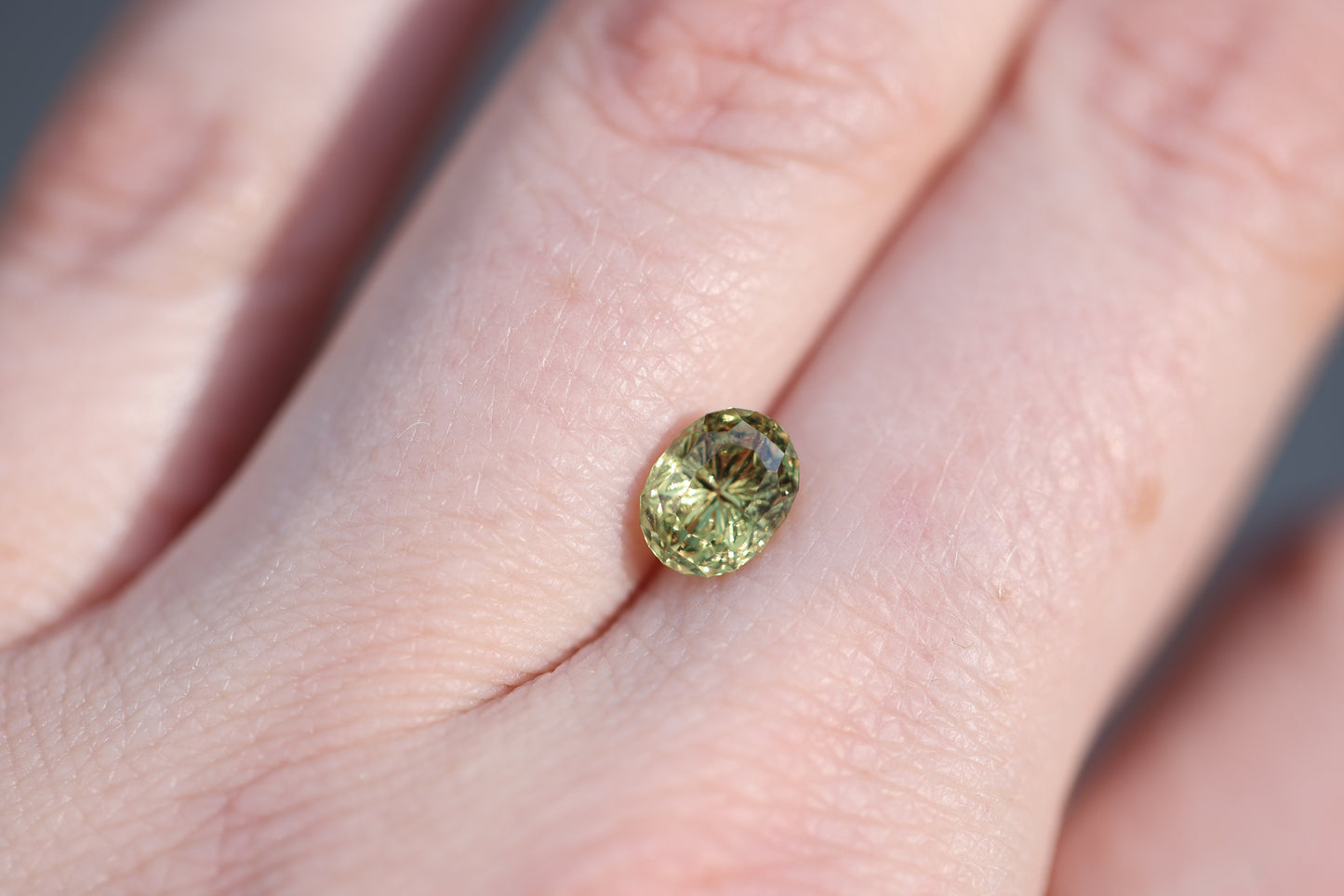1.63ct oval yellow hint of green sapphire - Starbrite cut by John Dyer
