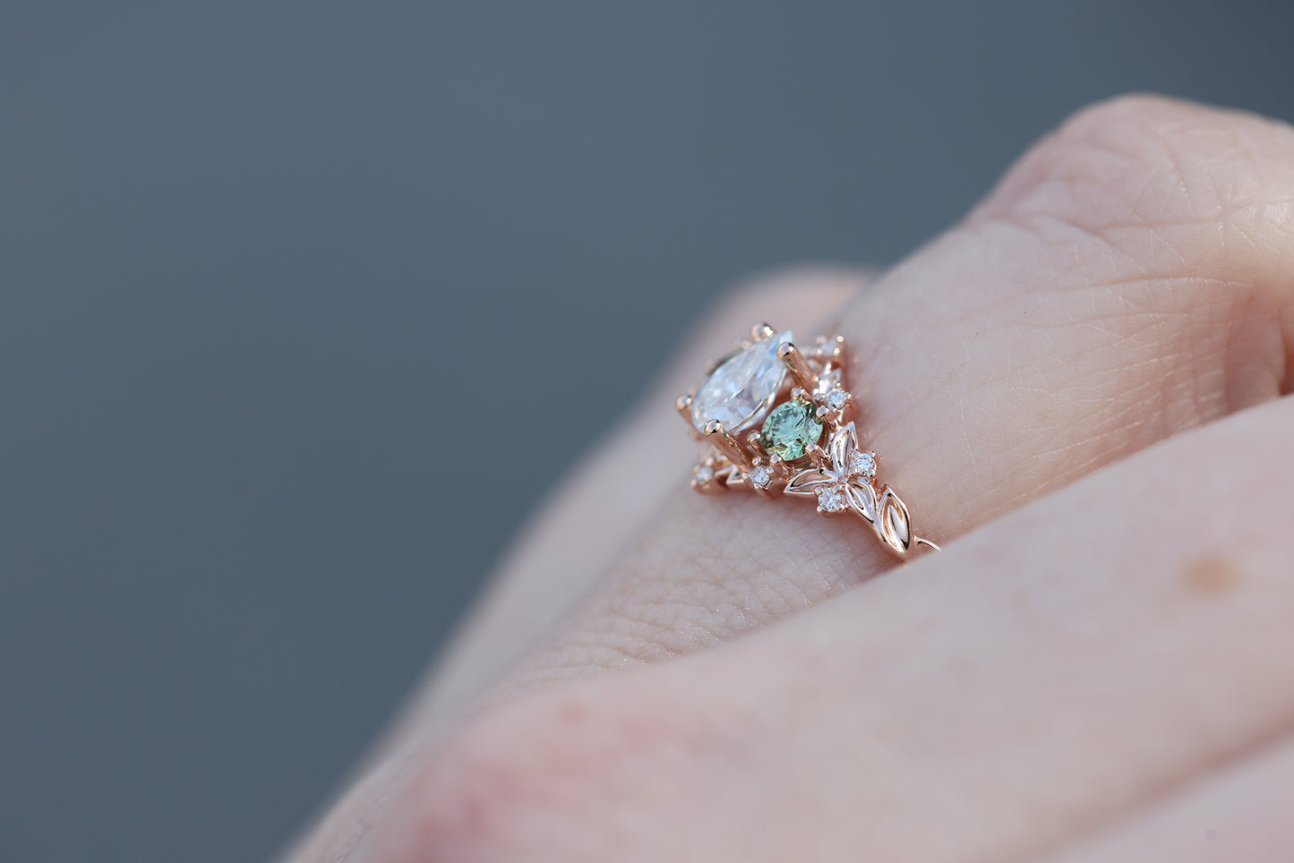 Briar Rose Three Stone with 6x4mm Pear Moissanite and mint side stones