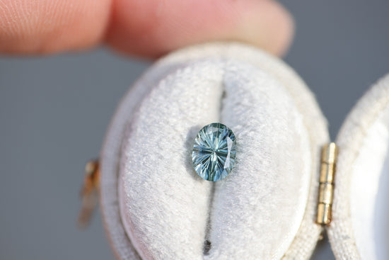 1.08ct oval light teal sapphire - Starbrite cut by John Dyer