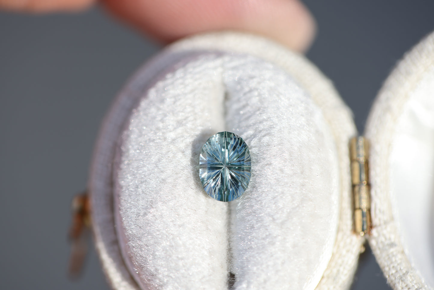 1.08ct oval light teal sapphire - Starbrite cut by John Dyer