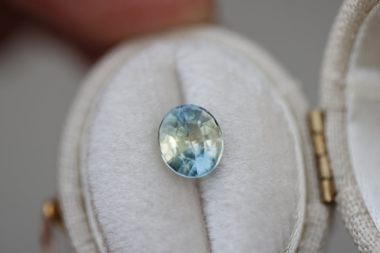 1.63ct oval parti yellow blue sapphire