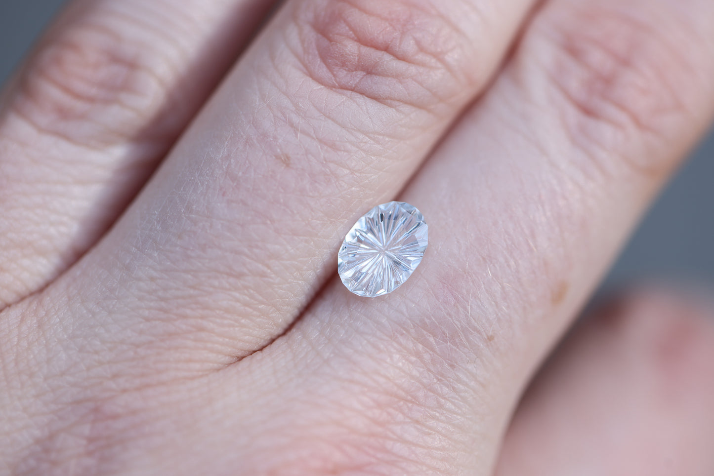 1.28ct oval white sapphire - Starbrite cut by John Dyer