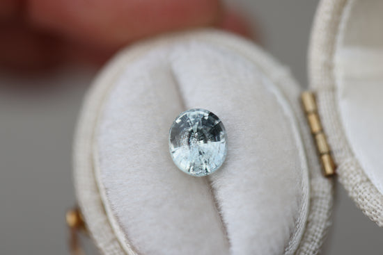Load image into Gallery viewer, 1.63ct oval very pale blue white sapphire
