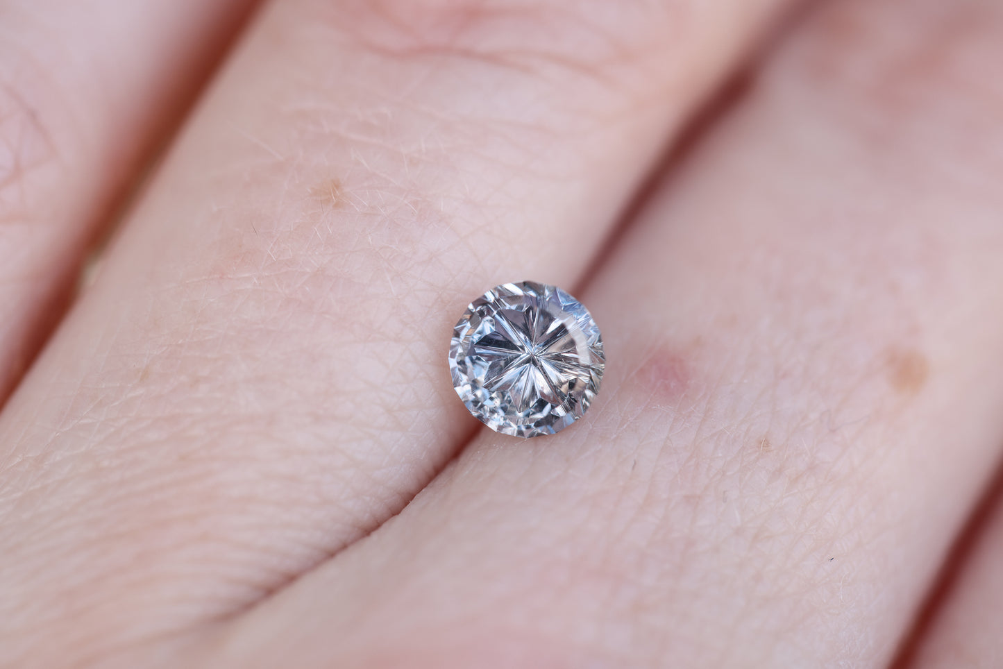 1.66ct round light grey blue sapphire- Starbrite cut by John Dyer