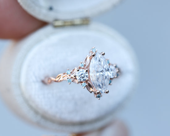 Load image into Gallery viewer, Briar rose three stone with marquise 10x5mm moissanite and aqua diamonds
