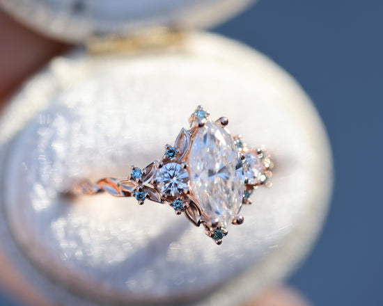 Load image into Gallery viewer, Briar rose three stone with marquise 10x5mm moissanite and aqua diamonds
