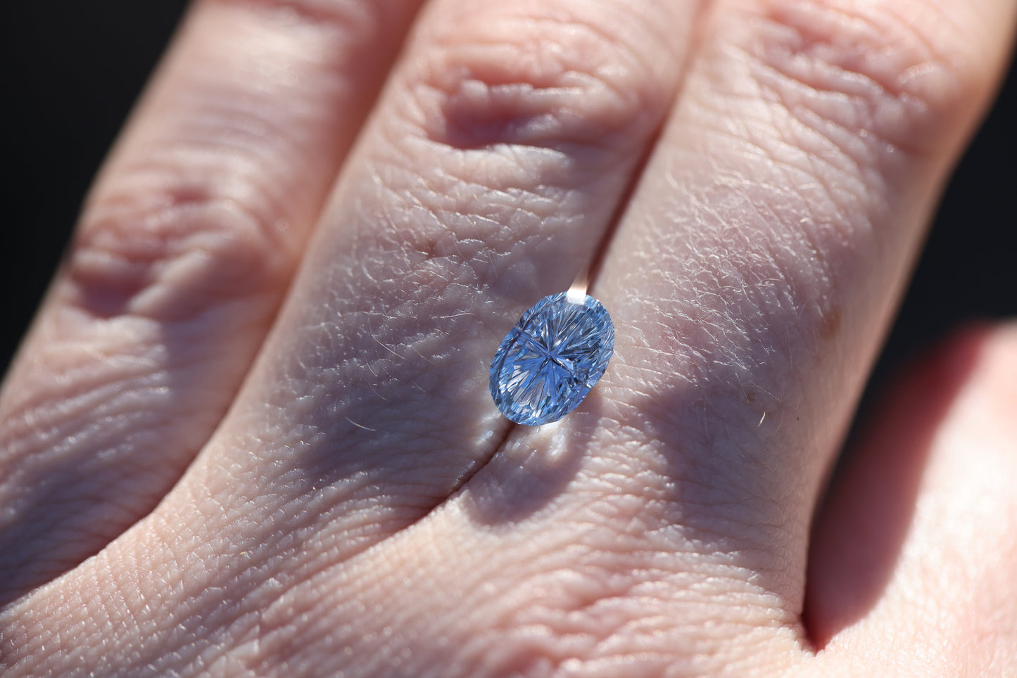 2.63ct oval blue sapphire, Starbrite cut by John Dyer