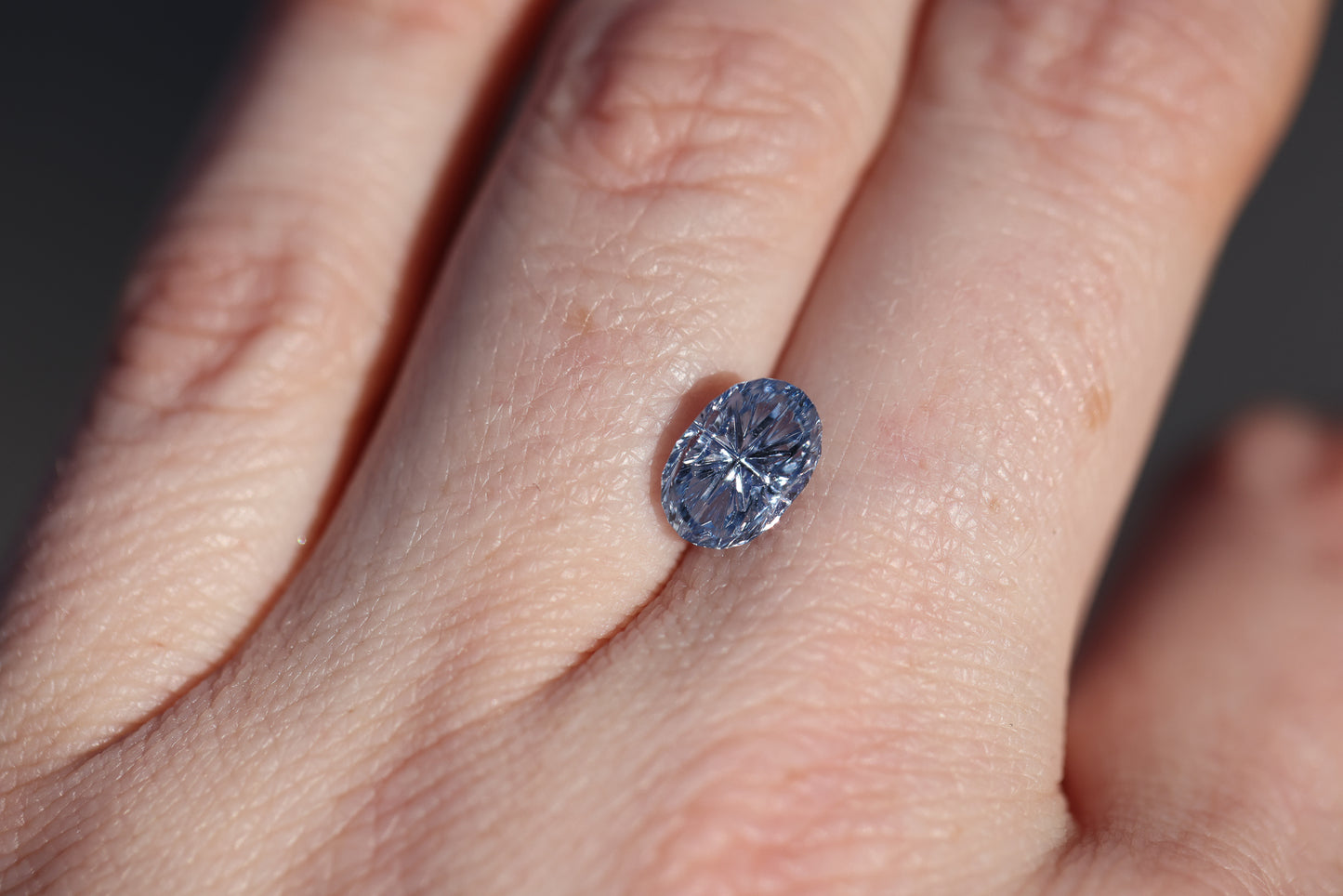 2.63ct oval blue sapphire, Starbrite cut by John Dyer