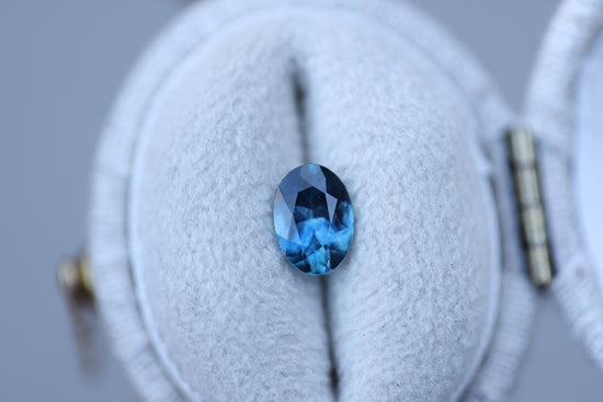 .84ct oval blue teal sapphire