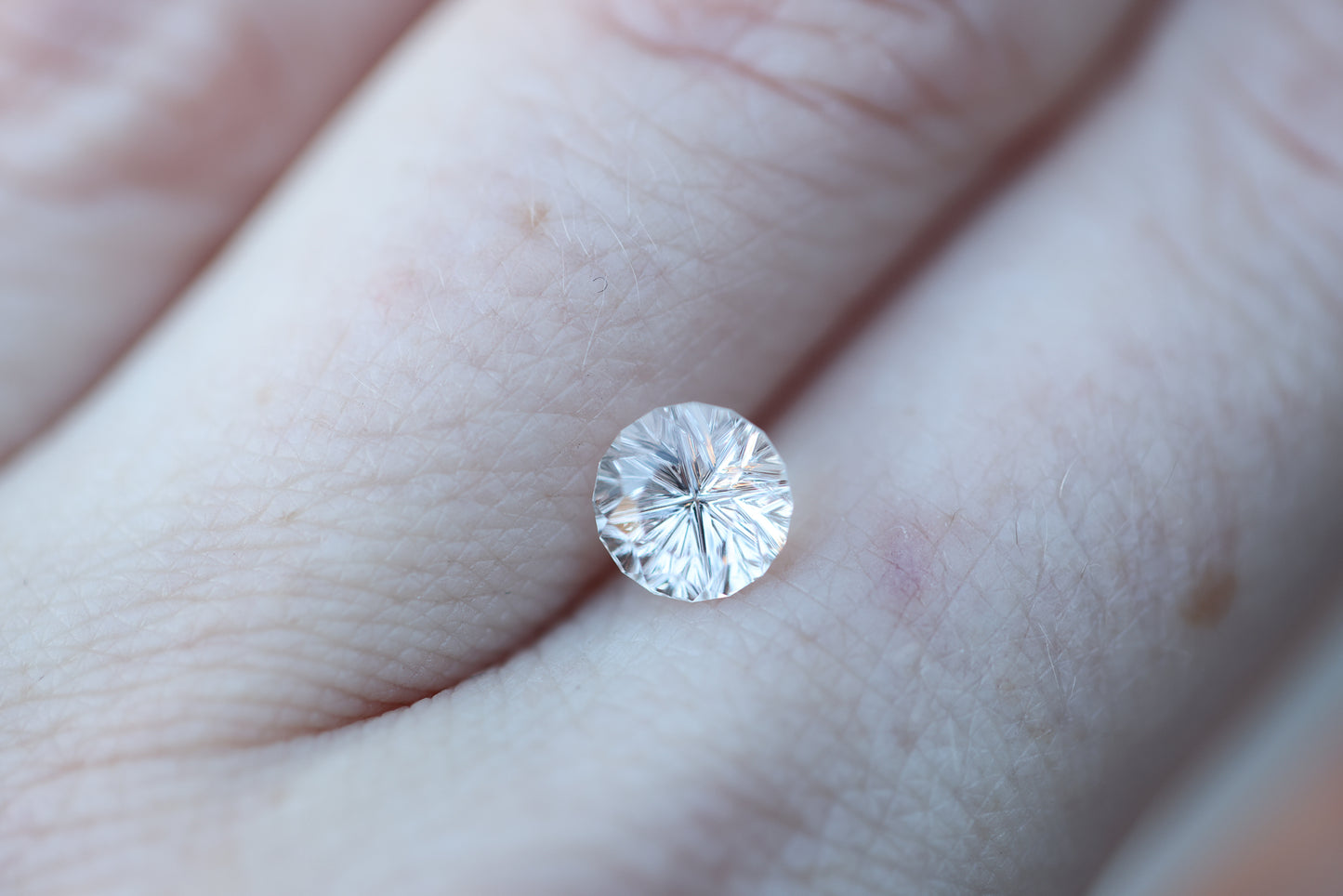 1.61ct round light pink/white sapphire - Starbrite cut by John Dyer