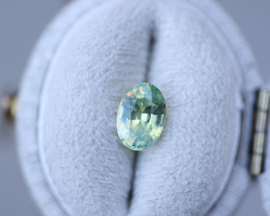 1.31ct oval opalescent green teal yellow sapphire