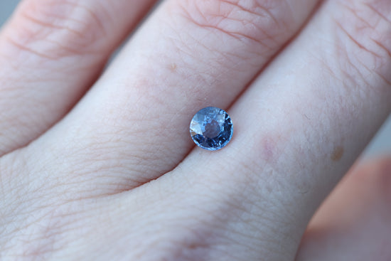 1.22ct round blue purple sapphire