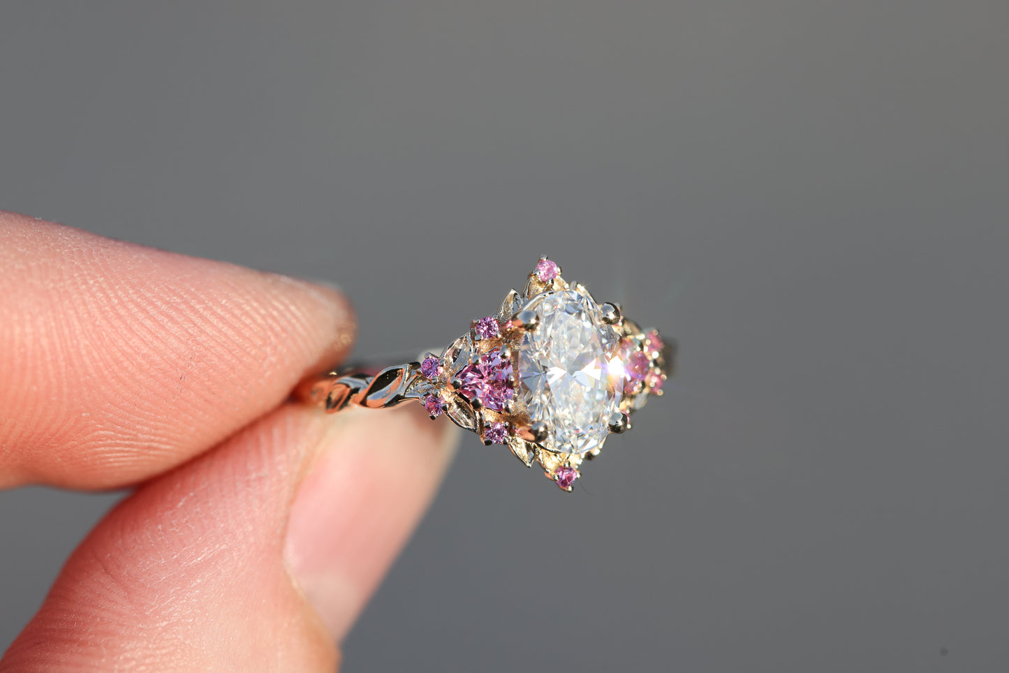 Briar rose three stone with 1.2ct oval lab diamond and pink sapphire accents