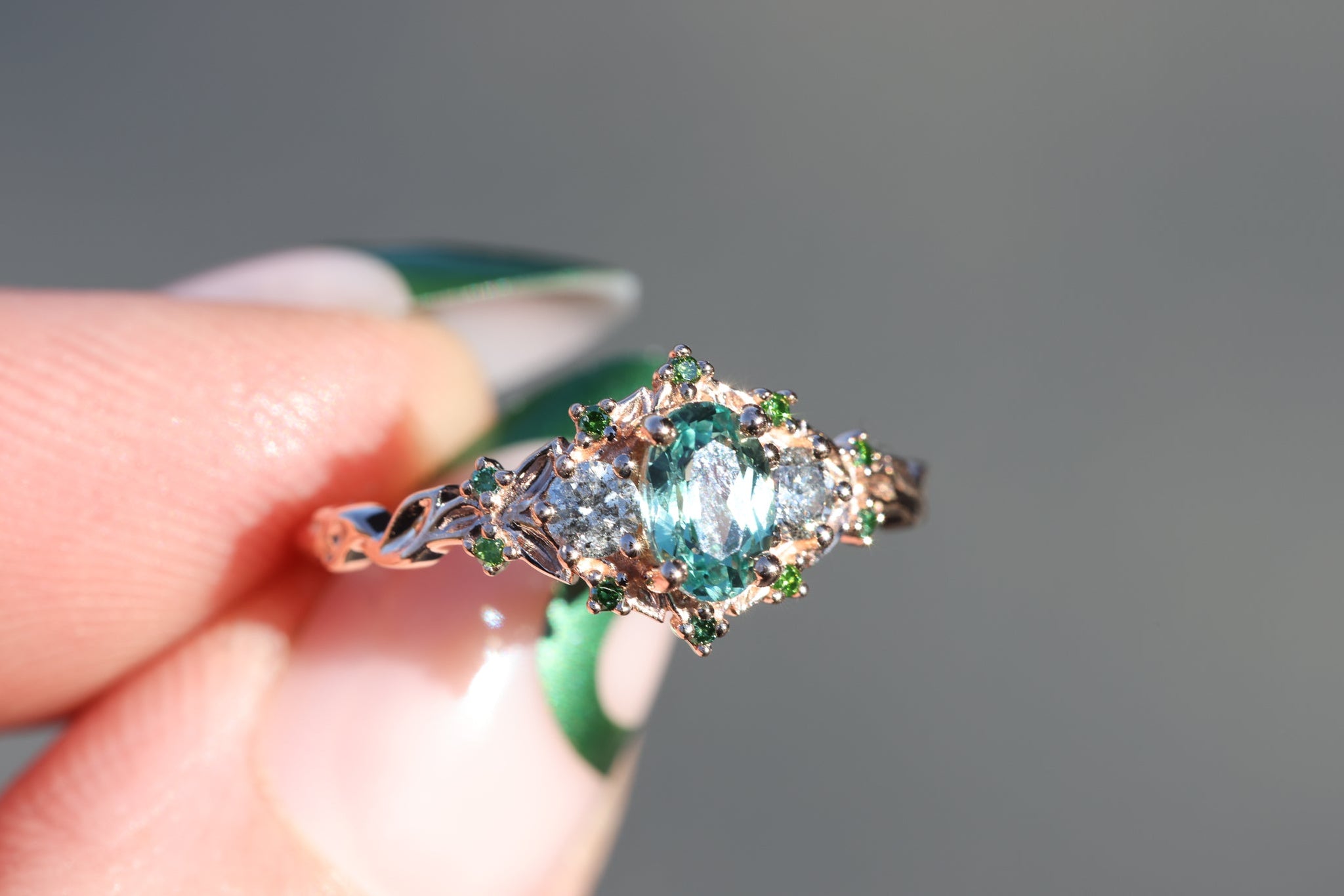 Briar rose three stone with oval lab green sapphire and salt and