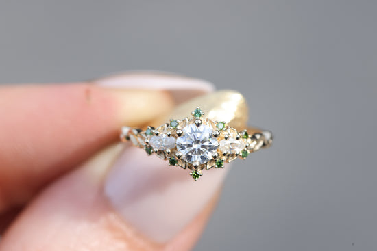 Briar rose three stone with round moissanite and dark green diamonds