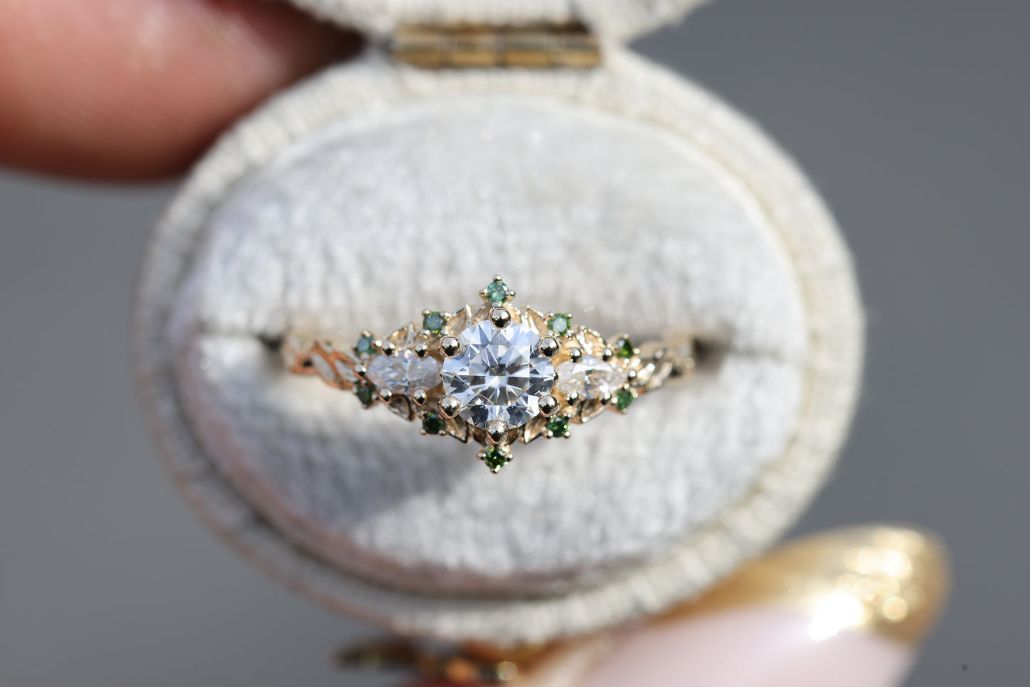 Briar rose three stone with round moissanite and dark green diamonds