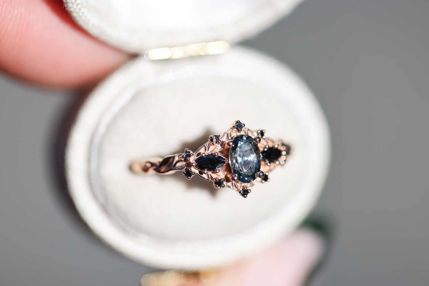 Briar rose three stone with oval grey spinel and black diamonds