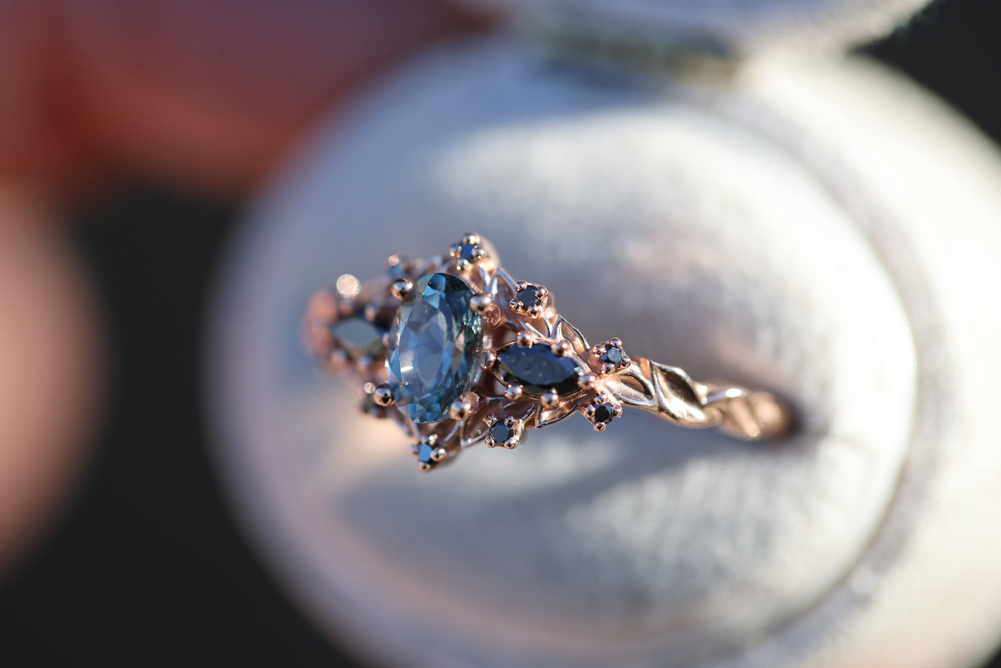 Briar rose three stone with oval grey spinel and black diamonds
