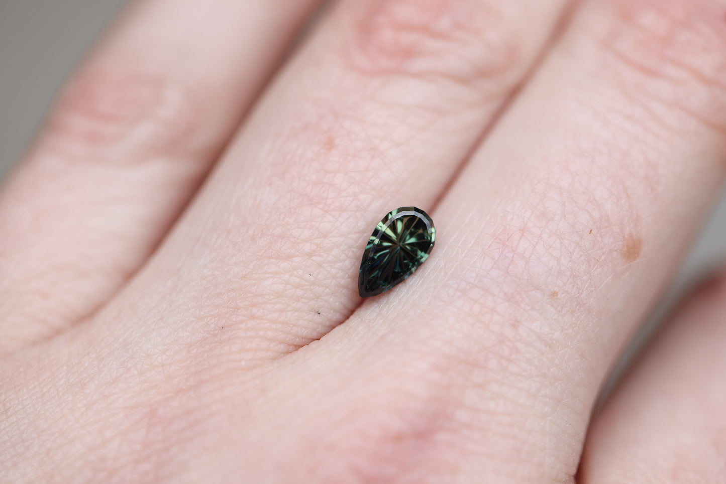 1.03ct pear blue green sapphire, Starbrite cut by John Dyer