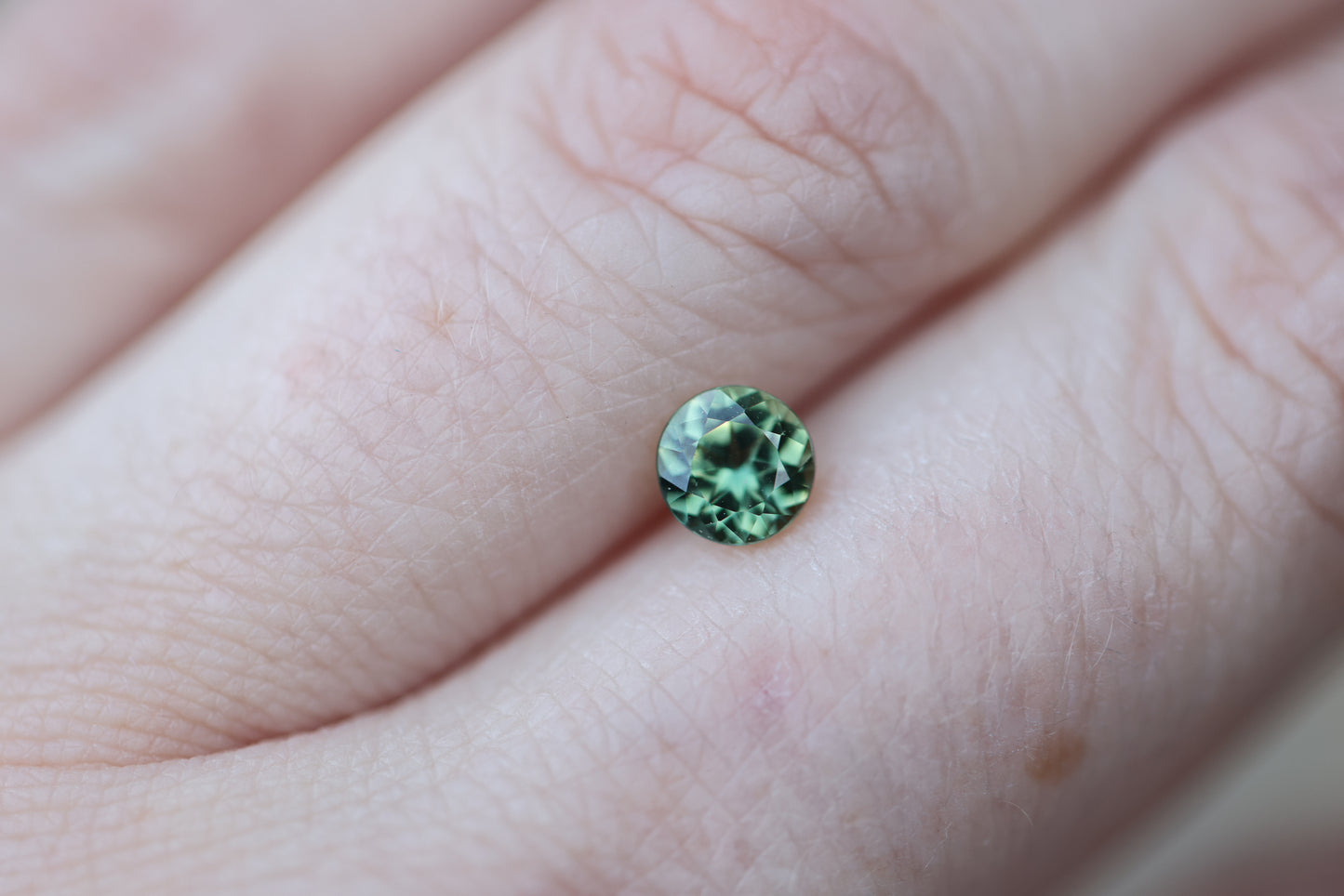 .88ct round green teal sapphire