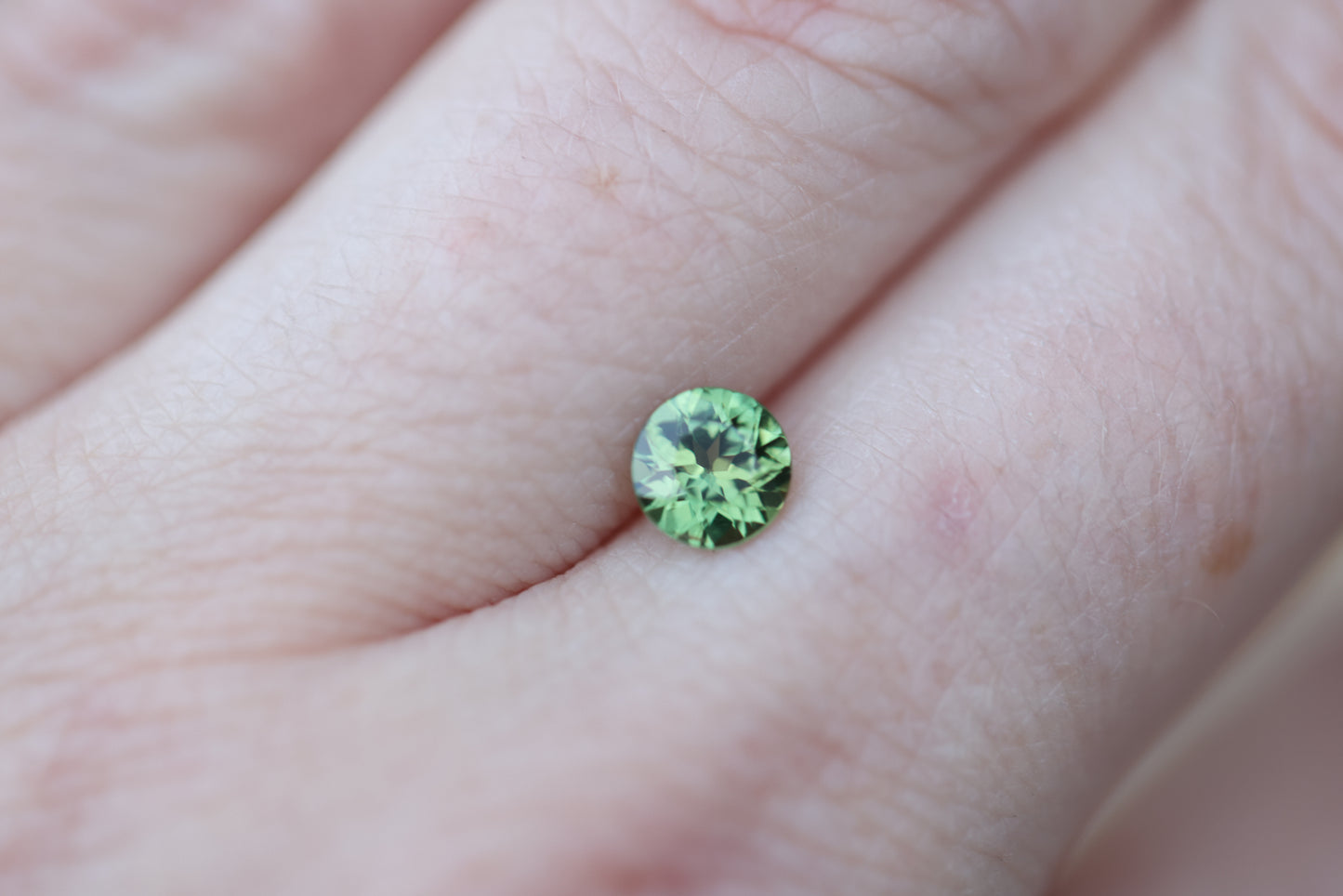 .84ct round green sapphire