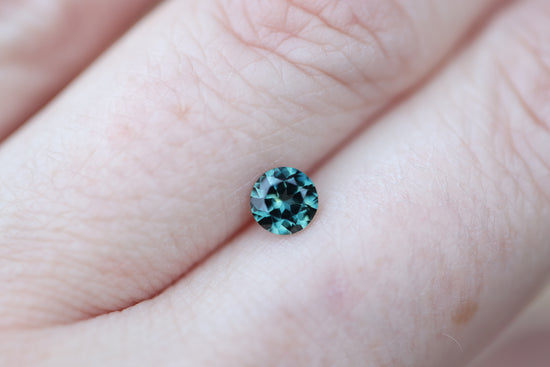 .55ct round teal green sapphire
