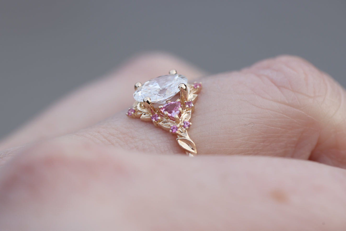 Briar rose three stone with 1.2ct oval lab diamond and pink sapphire accents