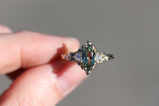 Briar Rose Three Stone with 10x5mm marquise lab green sapphire, mint diamond accents