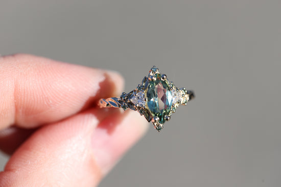 Briar Rose Three Stone with 10x5mm marquise lab green sapphire, mint diamond accents