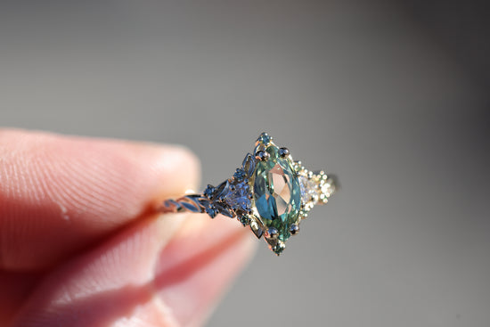 Briar Rose Three Stone with 10x5mm marquise lab green sapphire, mint diamond accents