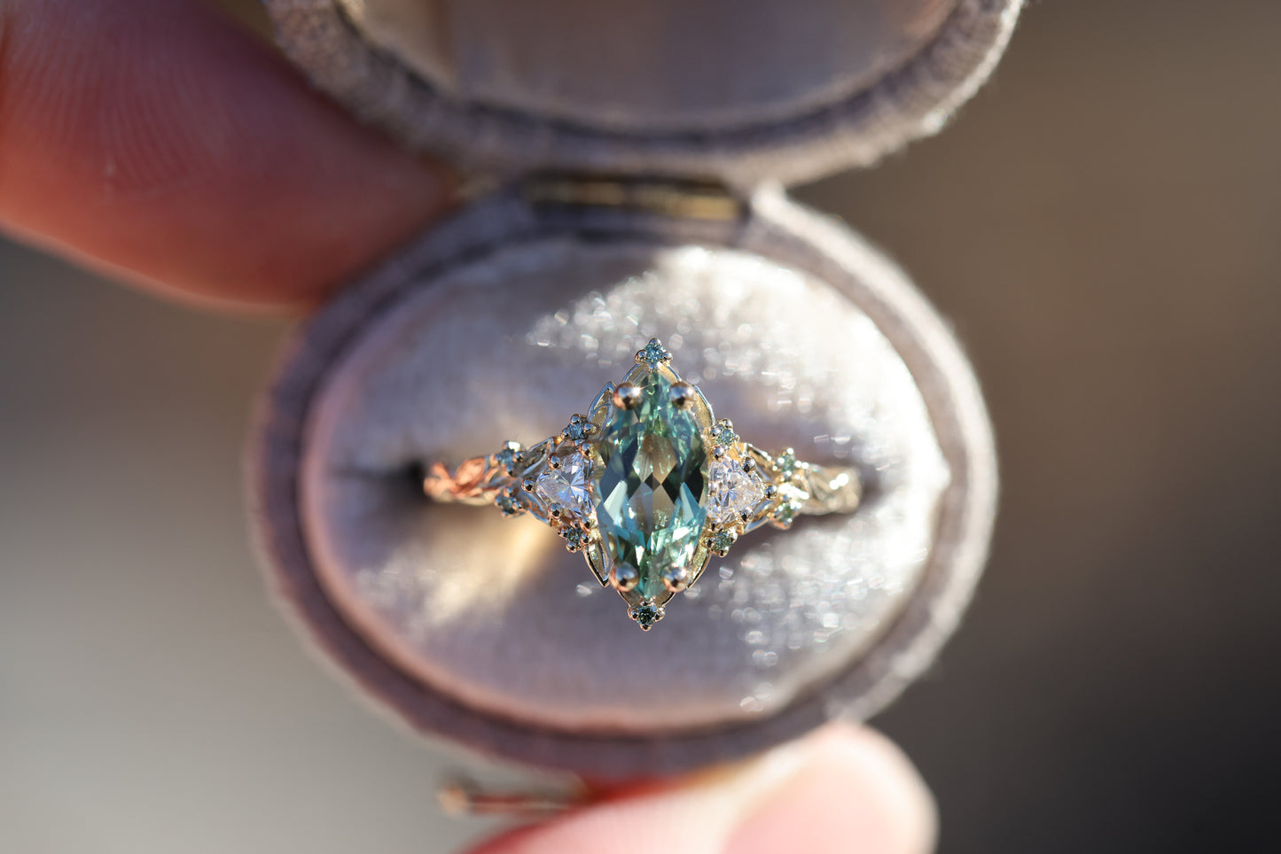 Briar Rose Three Stone with 10x5mm marquise lab green sapphire, mint diamond accents