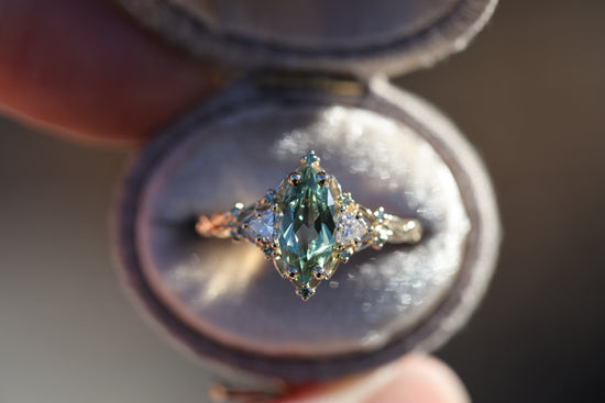 Briar Rose Three Stone with 10x5mm marquise lab green sapphire, mint diamond accents