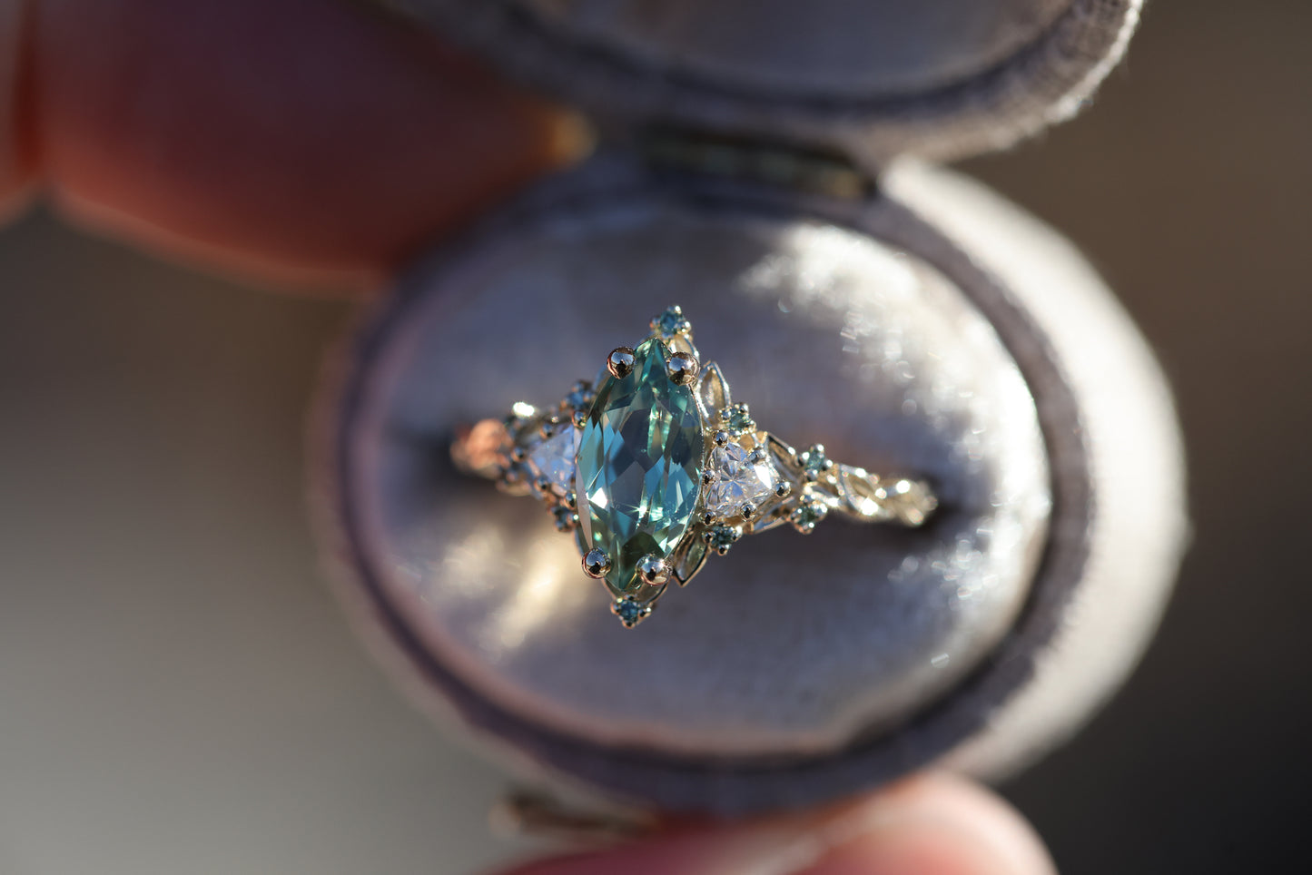 Briar Rose Three Stone with 10x5mm marquise lab green sapphire, mint diamond accents