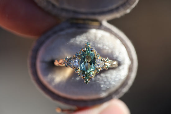 Briar Rose Three Stone with 10x5mm marquise lab green sapphire, mint diamond accents