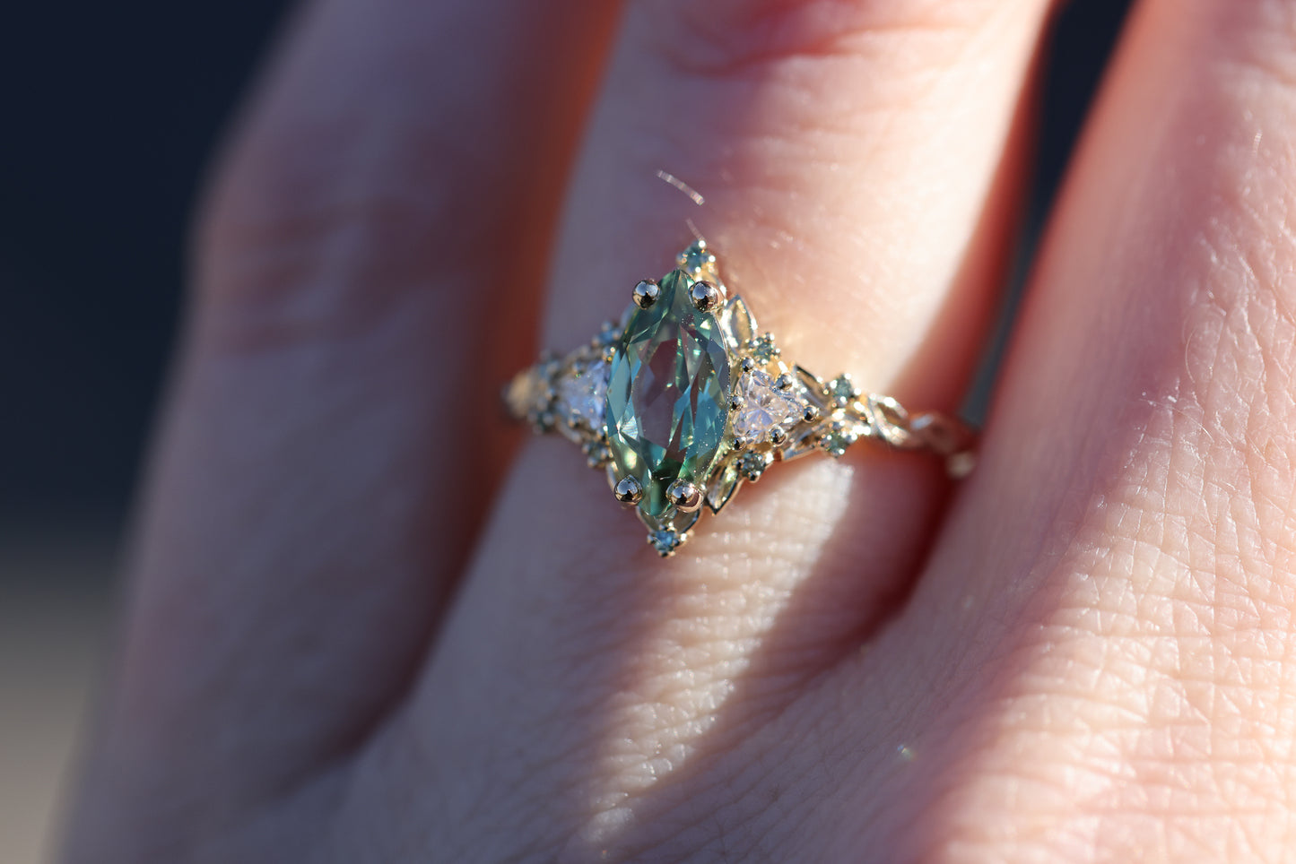 Briar Rose Three Stone with 10x5mm marquise lab green sapphire, mint diamond accents