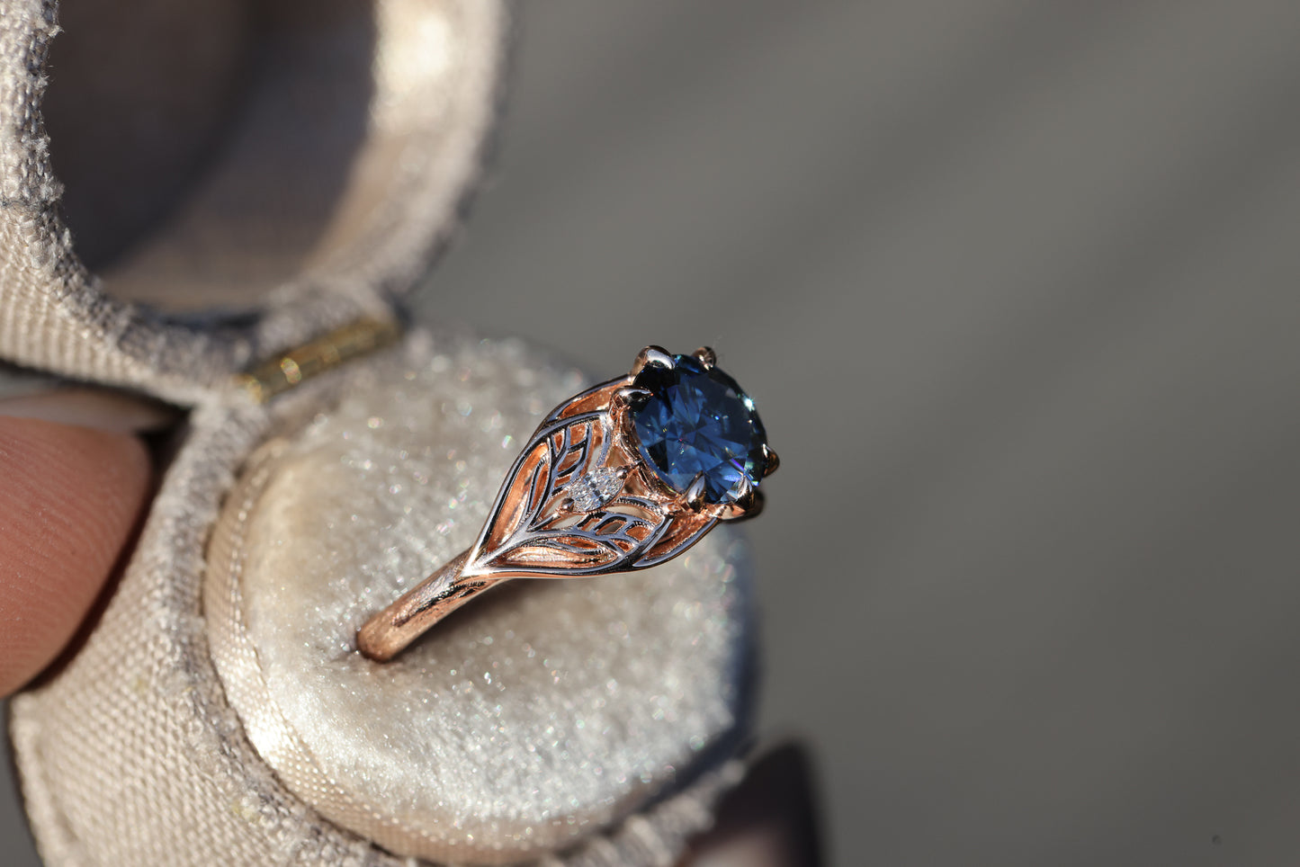 Elvindell three stone with 7mm dark blue moissanite